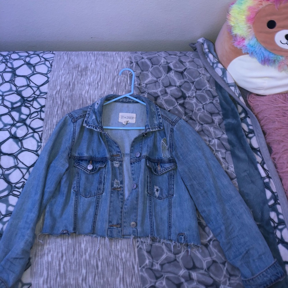 ripped denim jacket